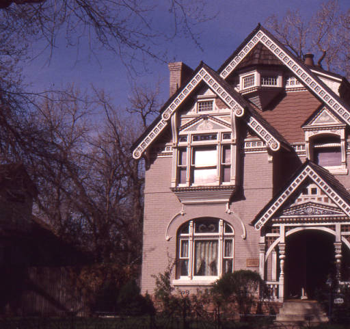 The Neef House is a well-executed version of the Queen Anne/Eastlake style.  The primary building material is brick, and there is a profusion of ornately decorated gables, roof forms, and window types.