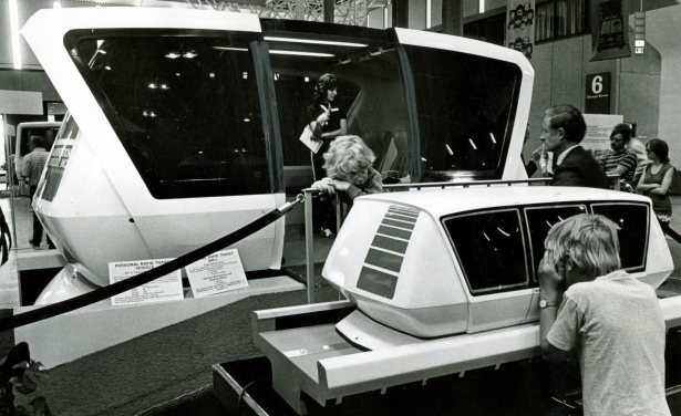 Checking a people mover model at the Personal Rapid Transit (PRT) Expo '73 Friday in Currigan Hall are Marty Van Doornick, 8, of 1630 Leyden St., front, and Philip Allen, 7, of 1544 Grape St. June 9, 1973. Photo by Mel Schieltz. (WH2129-2018-1309)