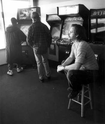 Russ Kanzenbach takes a break at Arcade in Aurora before it is closed down