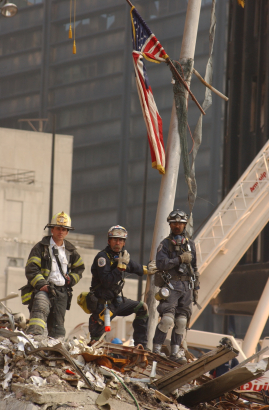 Firefighters amidst the rubble of the World Trade Center, New York City