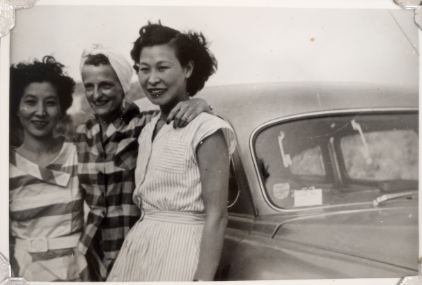 Kimiko Side (right) with two friends leaning against a car, circa 1940s. Kimiko Side Papers, WH2528, OVBx6