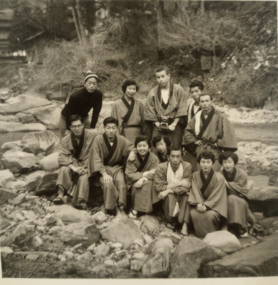 Kimiko and Gene (back row, center) with friends in Japan, circa 1950s