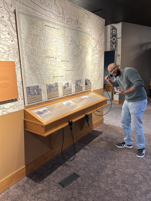 Museum Services Manager Dexter Nelson II with some of the technology being updated.
