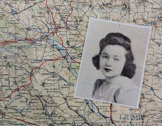 Photo of Ruby Auerbach on top of an AMS map