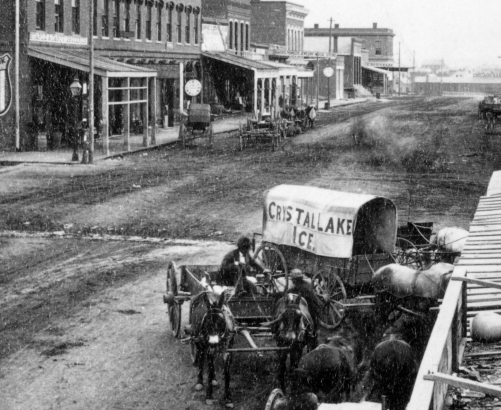 Larimer Street looking toward Cherry Creek showing a horse-drawn Crystal Lake Ice wagon, circa 1870. 	 X-23454