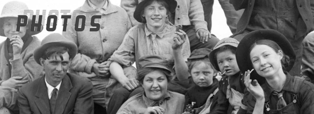 Group of young people by the river with corncob pipes and cigarettes