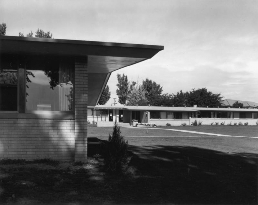 View of the Colorado State Home and Training School (or Ridge Home), an institution for the mentally handicapped, in Ridge, Jefferson County, Colorado; shows brick buildings with low gabled roofs and wide eaves.