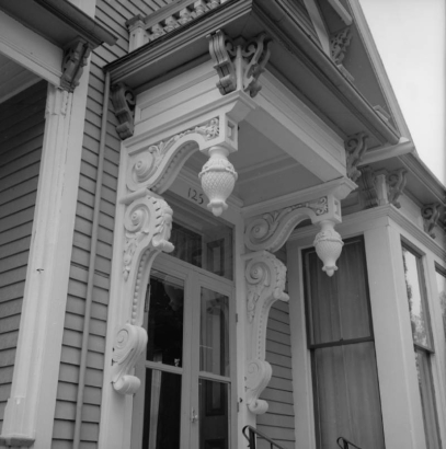 Salida, Chaffee County, Colorado, the Gray House features an ornate console portico over the entry. Wooden volutes and pendants adorn the Victorian style residence, built in the 1890's by G. R. Gray.