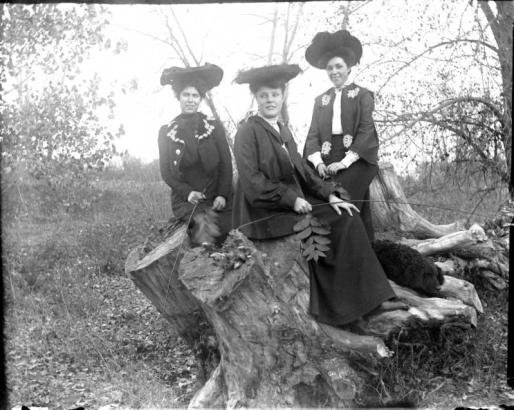 Outdoor portrait of women in Denver, Colorado; costume includes applique, jackets, and hats with veils.