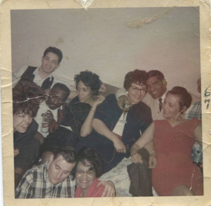 Photograph of Robert and Janice Ivery with friends during a party for her nursing class.