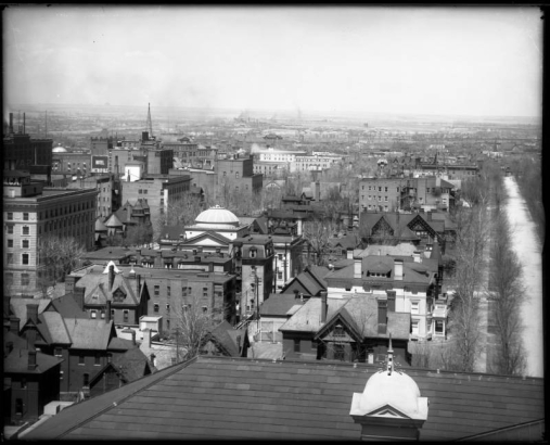 Right side of panorama view taken from Colorado State Capitol Building, Denver, Colorado; includes part of Capitol roof and turret, Sherman and Lincoln streets, corner of Y.M.C.A., and Trinity Church steeple. Signs read: "Hotel Metropole."