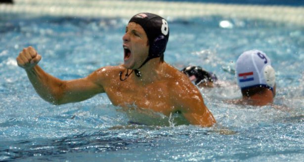 (Athens, Greece  on Sunday, Aug. 15, 2004) -American water polo Tony Azevedo celebrates a goal mid-way through the U.S.A.'s 7-6 win over Croatia at the Olympic Aquatic Centre Indoor Pool on Sunday night in Athens. Azevedo scored a buzzer-beating goal t...