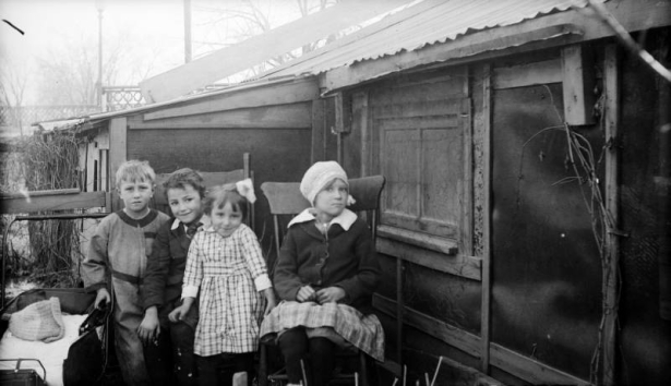 Outdoor portrait of girls and boys near Charles S. Lillybridge's house and studio in Denver, Colorado.