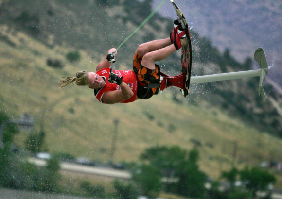 Darren Narens (CQ), gets some air as he competes in the advance division preliminaries Flip Out, Freeride, and Tricks Runs during day two of the Inaugural National Championships of the United States Hydrofoil Association at Soda Lake in Lakewood, Colo....