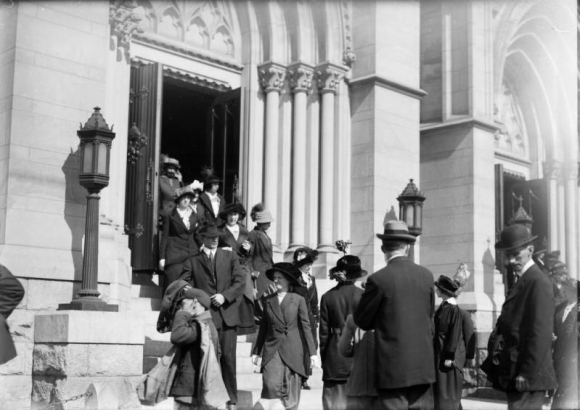 People exit the Cathedral of the Immaculate Conception on East Colfax Avenue in Denver, Colorado.