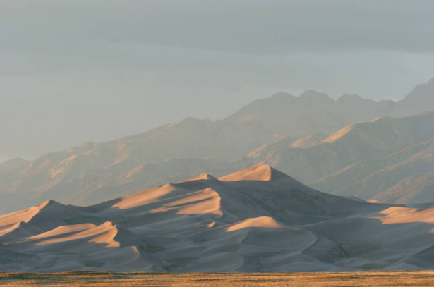I was sent to the Sand Dune National Monument the day that it was converted into a National Park. We missed the ceremony, so I just shot beautiful images of the dunes at sunset. But having lived in Taos, I knew that early morning light is always gorgeo...