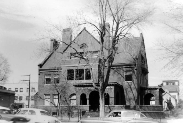 View on Sixteenth (16th) and Pennsylvania Streets, Denver, Colorado, shows a large brick house identified as having belonged to John Galen Lock. The sign over the door reads: "Colorado Educational Association."