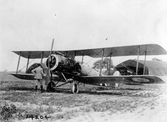 View of a Salmson single engine airplane in Warvillers (or Warfuilliers), Somme, Picardie, France; hangar tents are in the background.