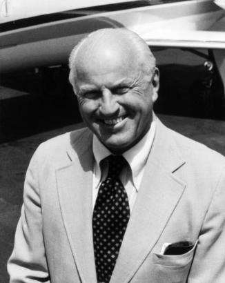 Portrait of Harry B. Combs, pilot, businessman, educator, and author.
