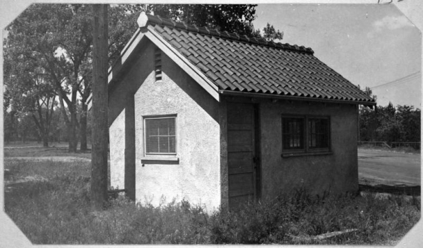 View of the water pump house in City Park near 23rd (Twenty-third) Avenue in Denver, Colorado. The building has a tile roof.