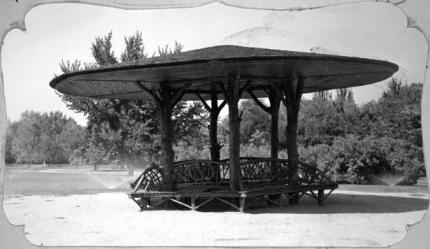 View of a covered wooden shelter in Cheesman Park, Denver, Colorado.