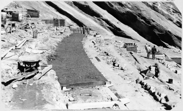 Shows Civilian Conservation Corps workers building seating at Red Rocks Park Amphitheater, Morrison, Jefferson County, Colorado.