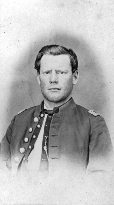 Studio portrait of Silas S. Soule. He wears a military uniform from the Civil War era.