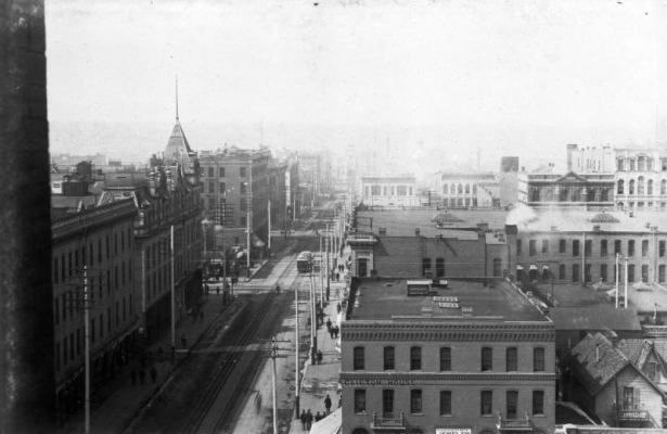 View on Arapahoe Street, Denver, Colorado, shows the "Clifton House," and other buildings downtown including the Grand Central Hotel.