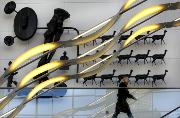 (DENVER , Colo., December 6, 2004)  A pedestrian makes his way up the staircase of Lobby A on the 14th Street side of the  new Denver Convention Center Expansion which  opened for business Monday as Denver Mayor John Hickenlooper cut the ribbon to offi...