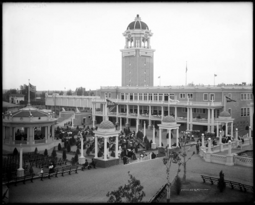 View of the White City amusement park (later named Lakeside) west of Denver, Colorado; shows small pavilions with banners, bandstand, and casino.
