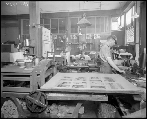 View of two printers working at the Smith-Brooks Printing Company in Denver, Colorado.