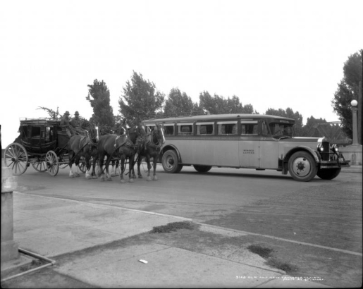 Publicity shot in Boulder, Colorado, used to promote modern motorcoaches over interurbans; shows new and old coaches parked on paved bridge, a Wells Fargo Company Stagecoach drawn by a team of horses with men  driving; an autobus labeled "The Denver & Interurban Motor Co. 27", on door "Bonded Carrier," over the windshield "Special;" curtains in windows and luggage rack on top; license plate reads Colo. 1925 or 1926 [?].