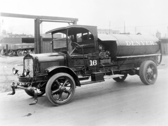View of a water tank truck for street cleaning in Denver, Colorado.