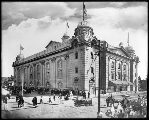 Exterior view of City Auditorium, 14th (Fourteenth) between Champa and Curtis Streets, Denver, Colorado; cornerstone laid September, 1907, and dedicated June 1, 1908 (held simultaneously with inauguration of Mayor Robert Speer); shows possible activities associated with Democratic National Convention of 1908.