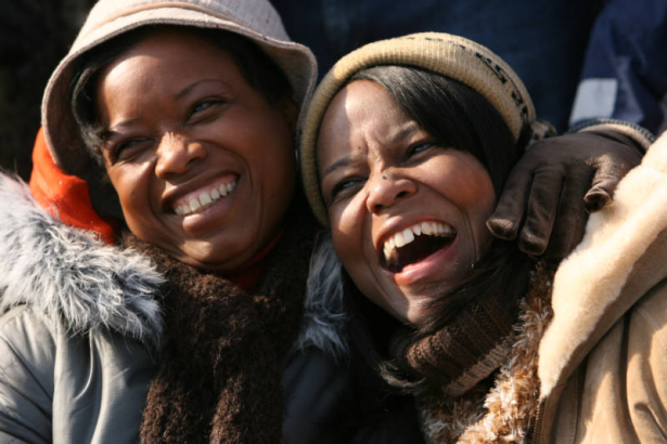 MJM129 Two unidentified woman smile on Tuesday, Jan. 20, 2009 during the Inauguration of President Barack Obama in Washington, D.C., where Mr. Obama became the 44th president of the United States and the first African-American to hold the office. (MATT...