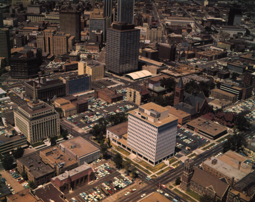 Aerial view of the North Capitol Hill neighborhood and downtown Denver, Colorado. Buildings include the Capitol Life Insurance Company Building, Farmers Union Building, Petroleum Building, Continental Oil Company Building, and the Federal Courthouse.
