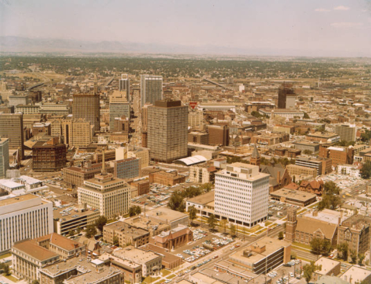Aerial view of downtown Denver, Colorado and the Capitol Life Insurance Company building at 16th (Sixteenth) Avenue and Grant Street. Buildings include the Bank Western Building, Security Life Insurance Building, and the Hilton Hotel.