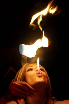 (Denver, Colorado, 11/15/2005) Weekend Spotlight:   Firemancer is a fire-dancing troupe slated to perform in this year's Parade of Lights. The two-person group, comprised of Doug Bates (cq) and Melinda Rivers (cq), demonstrated their skills at Club Sky...