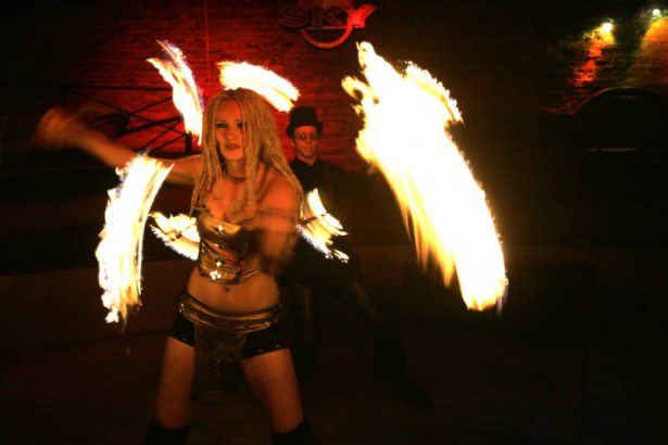 (Denver, Colorado, 11/15/2005) Weekend Spotlight:   Firemancer is a fire-dancing troupe slated to perform in this year's Parade of Lights. The two-person group, comprised of Doug Bates (cq) and Melinda Rivers (cq), demonstrated their skills at Club Sky...