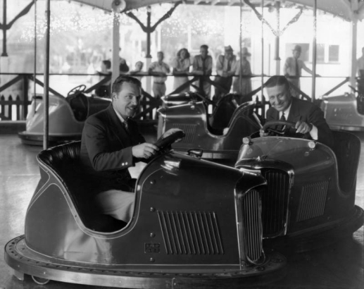 Eddie Brittain and Tom Gerun, members of an orchestra at Lakeside Amusement Park in Lakeside (Jefferson County), Colorado, pose in bumper cars.