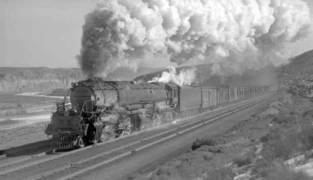 Westbound freight train, fine smoke effect; 51 cars, 35 MPH.   Photographed: near Riview, Wyo., November 29, 1941.