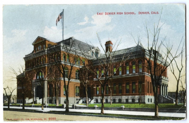 Color postcard of the Old East Denver High School building constructed in 1889.  Originally located on 19th and Stout, Denver, Colorado.