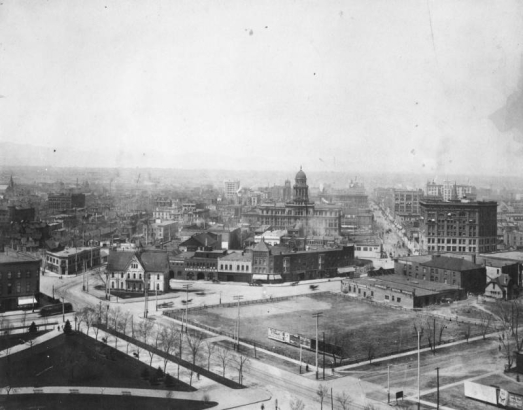 View of Civic Center and Denver, Colorado; shows the Denver Tramway Company power house, Denver Fire Department's Engine House Number One, the Imperial Apartments, the Araphahoe County Courthouse, the Kittredge Building, and the Majestic Building.