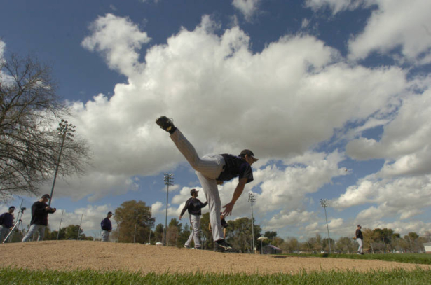 [(Tucson, AZ, Shot on: 2/23/05)]  Colorado Rockies AAA starting pticher Jason Young pitches before an Arizona sky during Spring Training at the Hi Corbett Field Sports Complex in Tucson, AZ, Wednesday Feb. 23, 2005.  (BARRY GUTIERREZ /ROCKY MOUNTAIN NEWS)