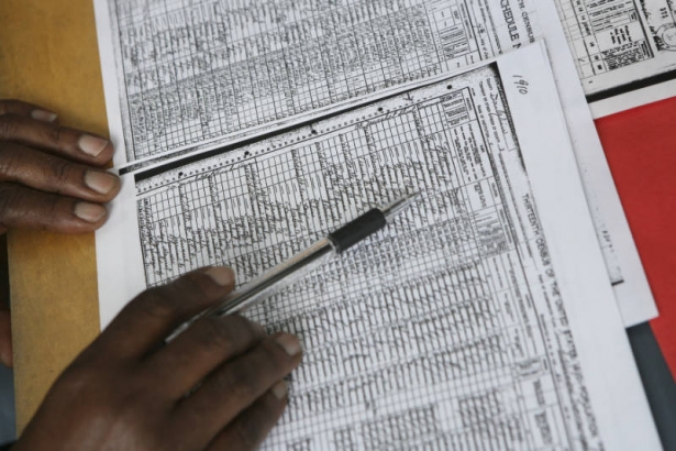 (HANDS) Ellen Icolari (CQ), 63, of New York City, New York, looks over some census records with in-law and Denver Public Library Docent Iris Hawkins (CQ/Not Pictured), 77, of Denver, at the Western History and Genealogy Department at the Denver Public ...