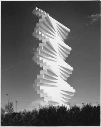 View of the Denver Art Museum's Herbert Bayer sculpture, "The Articulated Wall," at the Design Center at 595 South Broadway Street in the Baker Neighborhood of Denver, Colorado. The 85 foot sculpture has an enormous steel mast inside that is used as an armature on which stacked horizontal concrete bars have been anchored. The bars are offset so that they weave in and out and are held in place by the top member, using just the force of gravity.