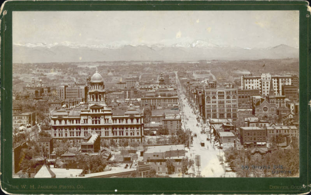 A panoramic view of Denver, Colorado; shows 16th (Sixteenth) Street, the Denver City Hall, the Arapahoe County Courthouse, the Kittredge Building, and the First Congregational Church. The Front Range is in the distance.