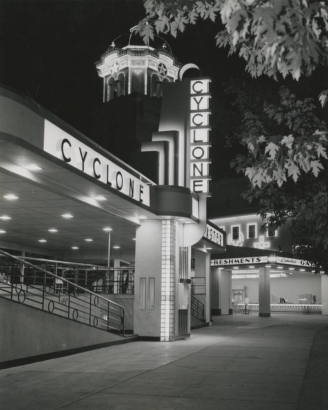 Entrance and sign for Cyclone Roller Coaster, Lakeside Amusement Park, Denver, Colorado, photograph taken at night