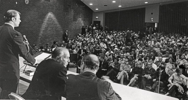 The virtues and drawbacks of having Nordic Olympic events staged in their community were debated by Evergreen residents Thursday. Doug Jones, left, president of the Mountain Area Planning Council, a group opposed to the site location, acted as sponsor of the meeting attended by Denver Olympic Committee president Robert Pringle, center, and F. G. Robinson, in charge of site selection.