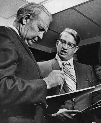 Carl DeTemple, left, president of the Denver Olympic Organizing Committee (DOOC), was served a restraining order Thursday by attorney Harry L. Arkin, right, barring the DOOC from telling The International Olympic Committee that Denver won't host the 1976 Winter Games. Arkin represents a new citizens group hoping to raise money to save the Games from Tuesday's vote cutting off state, city and federal funds. DeTemple criticized the action.